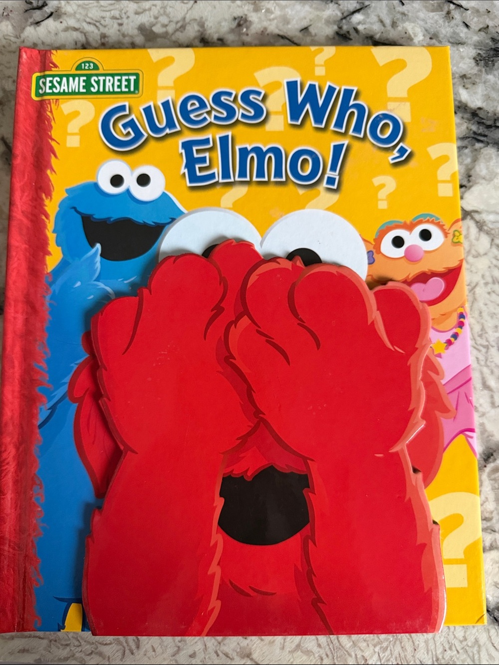 Sesame Street Elmo Peekaboo Board Book - Red, Yellow, Blue